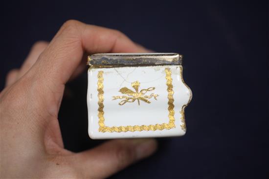 A late 18th / early 19th century French gilt metal mounted commode shaped white enamel snuff box, 3in.